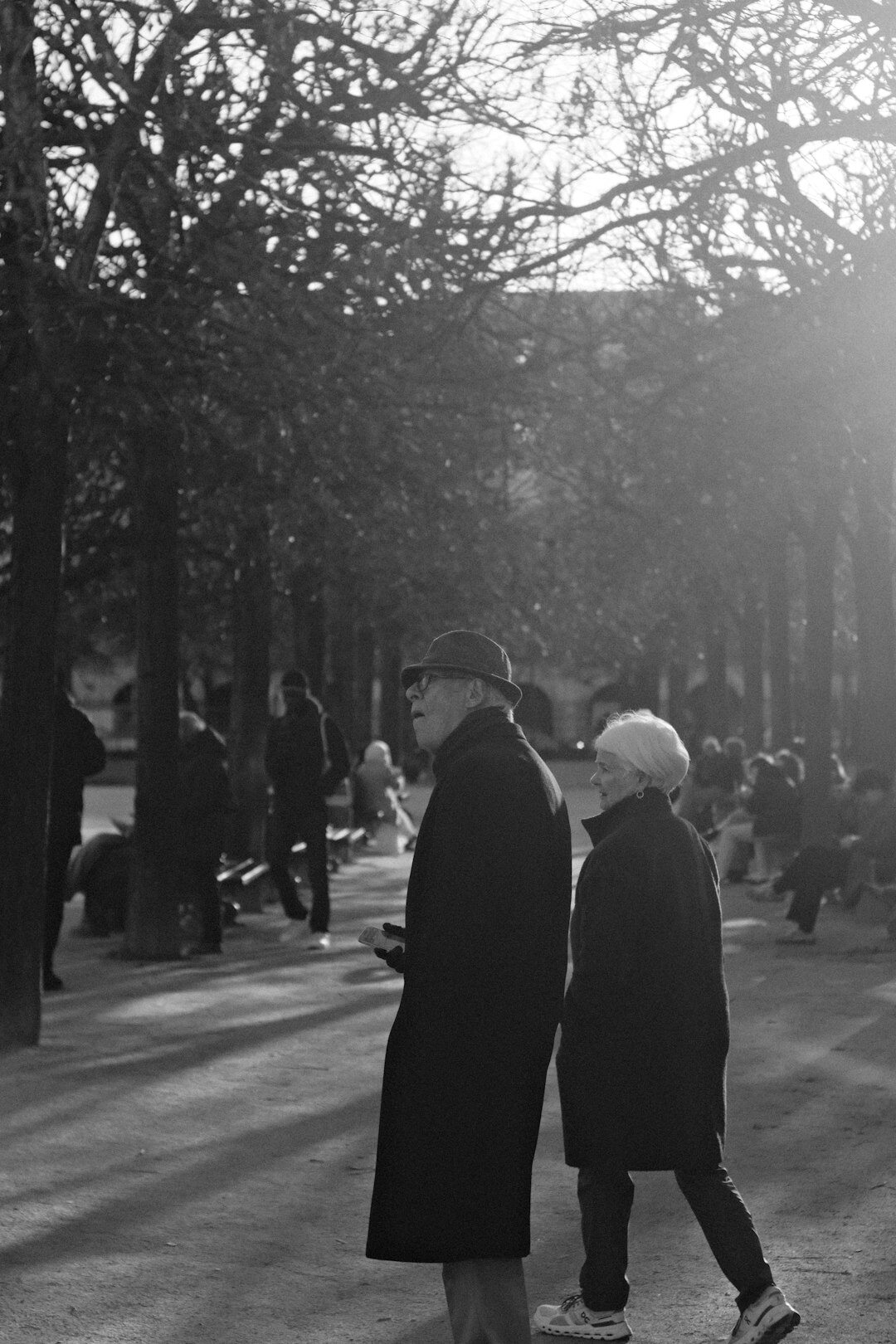 senior couple walking in park