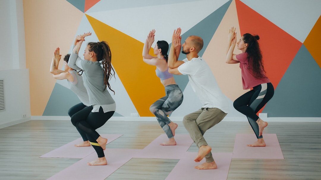 seniors doing yoga in studio