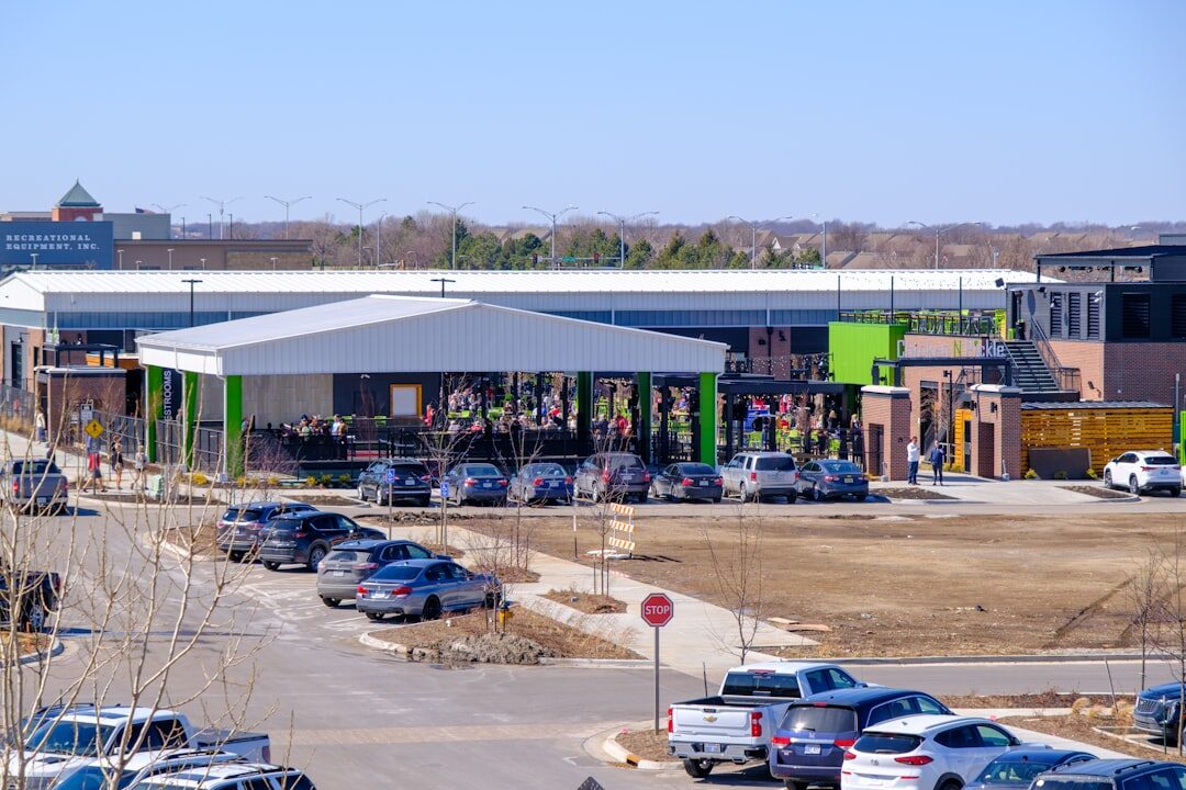 Bright community center entrance with people arriving for activities